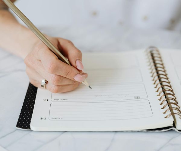 Calendar with a highlighted daily schedule showing a consistent workout routine.